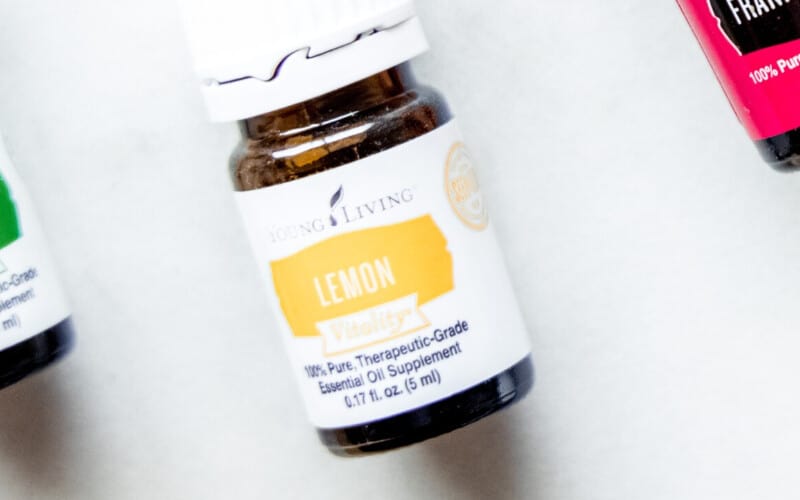 Close up of a bottle of lemon essential oil.